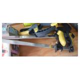 Large group of clamps (at least 12)  and 2 Adjustable clamps