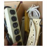 Large group of extension cords and outlet strips