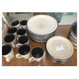 Setting for 12 - plates, cups, bowls