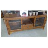 Nice occasional table with glass front doors