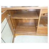 Nice occasional table with glass front doors