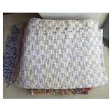 group of woven rag rugs and 3 waste baskets