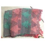 group of woven rag rugs and 3 waste baskets