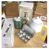 Kitchen scale, tea pot, cup, Pampered chef cutters, and Gripper for cutting fabric