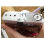 Vintage Zeiss SLR camera and flash and light meter