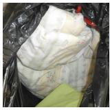 Stack of blankets and comforters