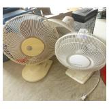 three oscillating fans