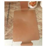 Three cake pans, two with covers and one with a cake cutter and a lift out sheet as well