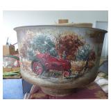 Painted screener from a cream separator, and a plant pot