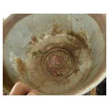 Painted screener from a cream separator, and a plant pot