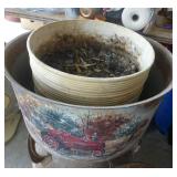 Painted screener from a cream separator, and a plant pot