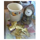 Box full of candles and a warmer for pot pourrie, plus a desk clock and a decorative pot and metal birds