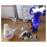 Decorative items, the blue vase is from a custom glass blower in Czechlosavakia