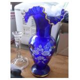 Decorative items, the blue vase is from a custom glass blower in Czechlosavakia