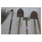 shovels, rake, axe, hoe and an extra handle