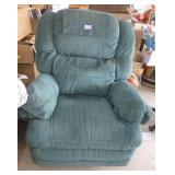 Lazy Boy recliner.  Has one tear by the head rest