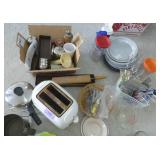 Large group of kitchen items, mixer, toaster, pan, measuring cups and scoops, salt and pepper grinders, nut crackers