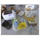 Large group of kitchen items, mixer, toaster, pan, measuring cups and scoops, salt and pepper grinders, nut crackers