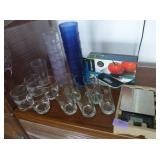 Group of glasses, plastic and glass, and a digital food scale