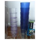Group of glasses, plastic and glass, and a digital food scale