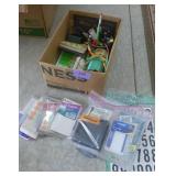 box of garage sale labels, letters, stickers etc