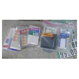 box of garage sale labels, letters, stickers etc