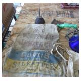 Vintage nail aprons, sander, oil can, animal comb, wire brush, blue light