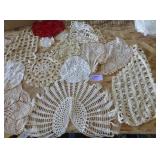 Lot of vintage doilies, arm rest covers