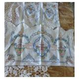 This lot has 4 large dresser scarves, some doilies and arm covers