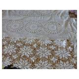This lot has 4 large dresser scarves, some doilies and arm covers