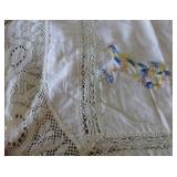 This lot has 3 table cloths and large dresser scarves