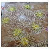 Colorful intricate and starched doilies