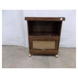 Wooden cabinet on casters