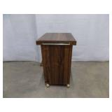 Wooden cabinet on casters
