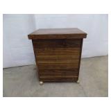 Wooden cabinet on casters