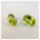 Pair of PERIDOT - 2.87ct. Oval brilliant cut