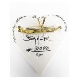 P. Buckley Moss Membership Society Story Of Love (Serial # 31040), Heart Shape With Picture Of Young Couple. Porcelain brooch With Pendant.