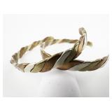 Set of two Tri-Tone Twisted Base Metal Cuff Bracelets.