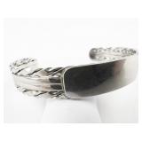 Twisted Stainless Steel Cuff Bracelet.