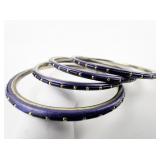 Set Of 4 Navy Blue Base Metal Bangles.