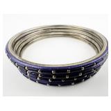 Set Of 4 Navy Blue Base Metal Bangles.