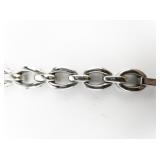 CZ Accented Base Metal Link Bracelet.