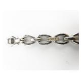 CZ Accented Base Metal Link Bracelet.