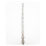 CZ Accented Base Metal Link Bracelet.