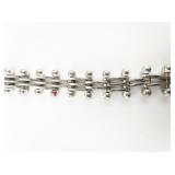 Unique White Base Metal Bracelet.