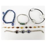 Group of 5 Base Metal Bracelets.