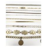 Group of 10 Chain, Herringbone, & Charm base Metal Bracelets.