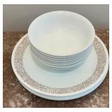 Seven Corelle Plates and Bowls