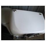 Toilet with tank disassembled for easy removal