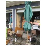 Patio umbrella with a milk can to hold it